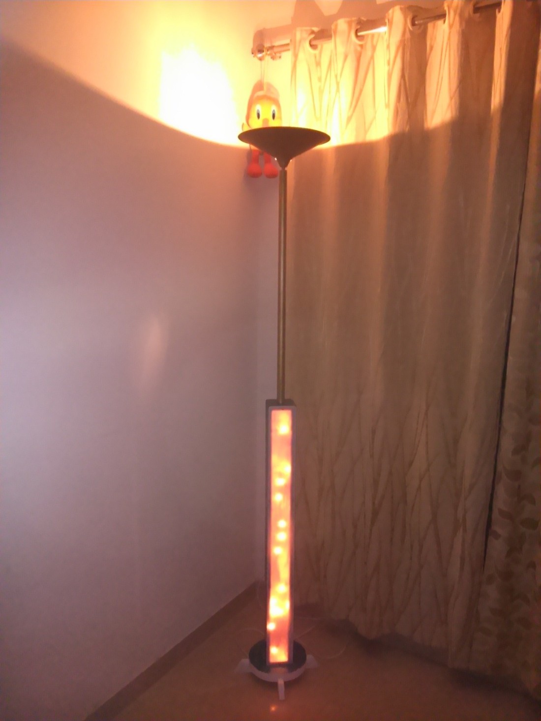 The completed tall lamp. I usually keep the lighted screen towards corner to give the room a warm hue.